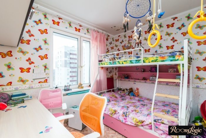bright butterfly wallpaper in girls' room