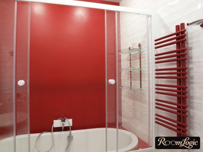 bright red color in the bathroom of a tiny apartment