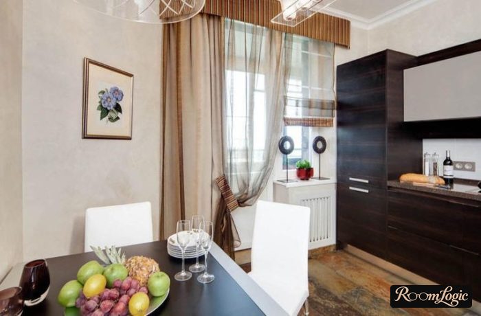 brown curtains with valance on kitchen with balcony block