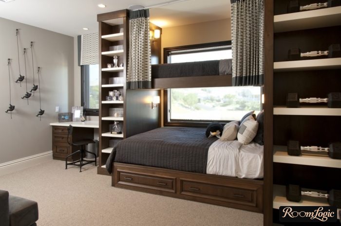 brown furniture and bed on 2 levels in the room