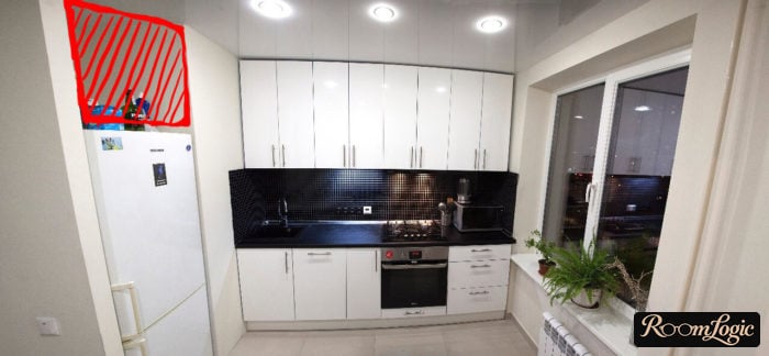 built-in cabinets in a small kitchen extending to the ceiling