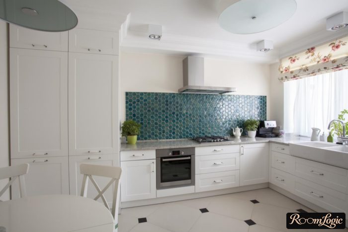 built-in refrigerator in a corner kitchen with a penal without a top