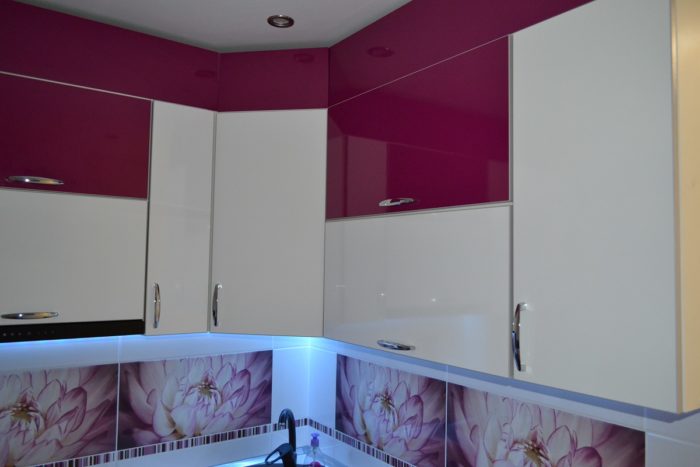 Cabinet fronts extending to the ceiling in a tiny apartment