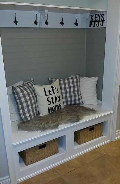 cabinet with a bench and shoe storage