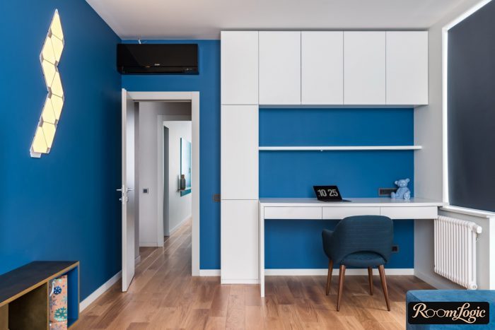 cabinet with white furniture and blue wall