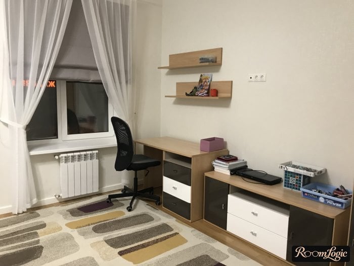 Cabinets and a desk in a high school student's room