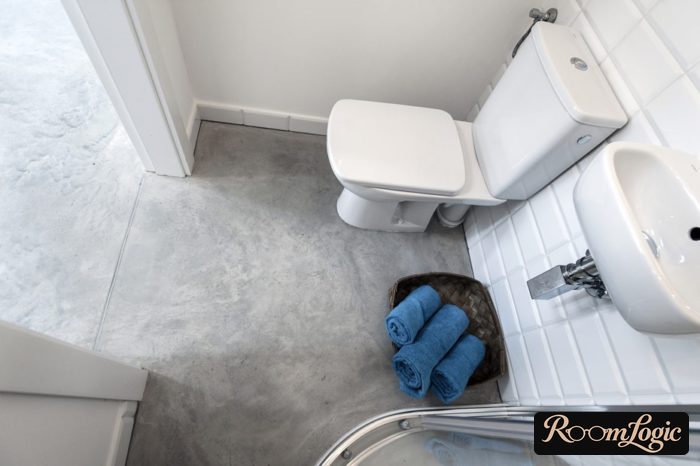 cast concrete floor in bathroom