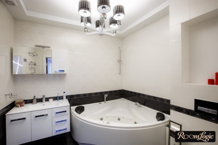chandelier in bathroom interior combined with toilet