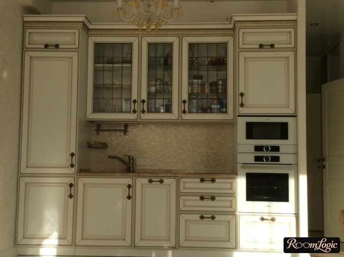 classical kitchen in light tones with natural lighting