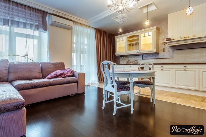 classical-style kitchen-living room with parquet and tile flooring
