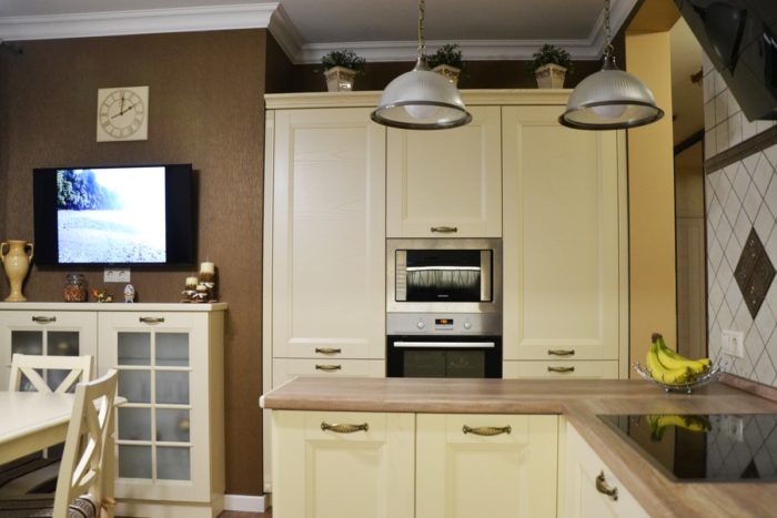 classical white kitchen with wood-look countertop