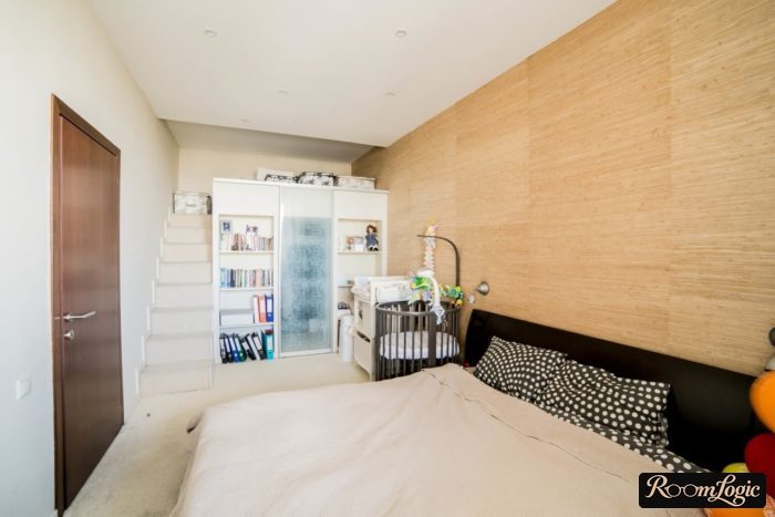 closet with loft bed in child's nook bedroom