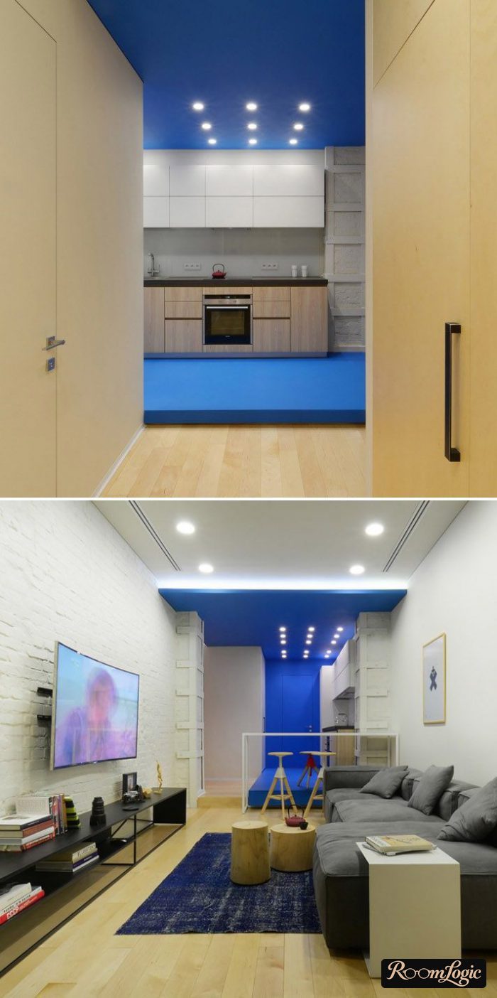 combination of blue and wood in the interior of a studio apartment