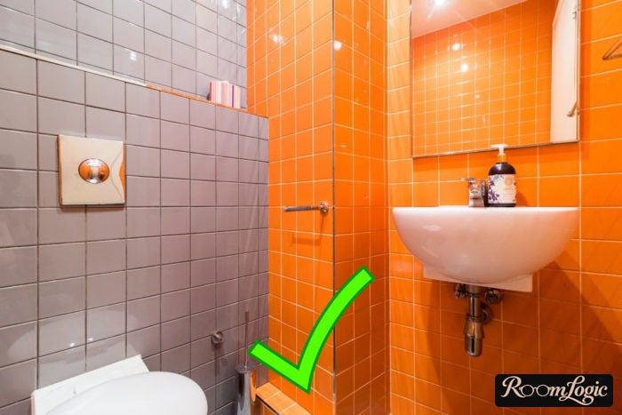 combination of gray and orange tile in the bathroom