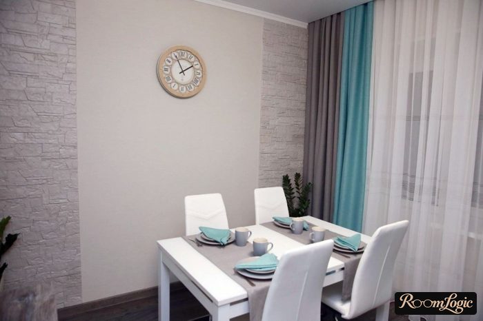 combination of light blue and gray curtains on one side of the kitchen