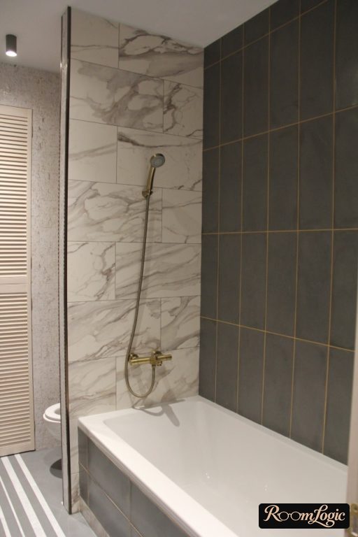 combination of tile in small bathroom