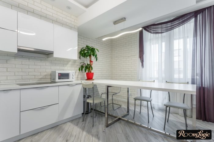 combination of violet and white sheer curtains on the kitchen