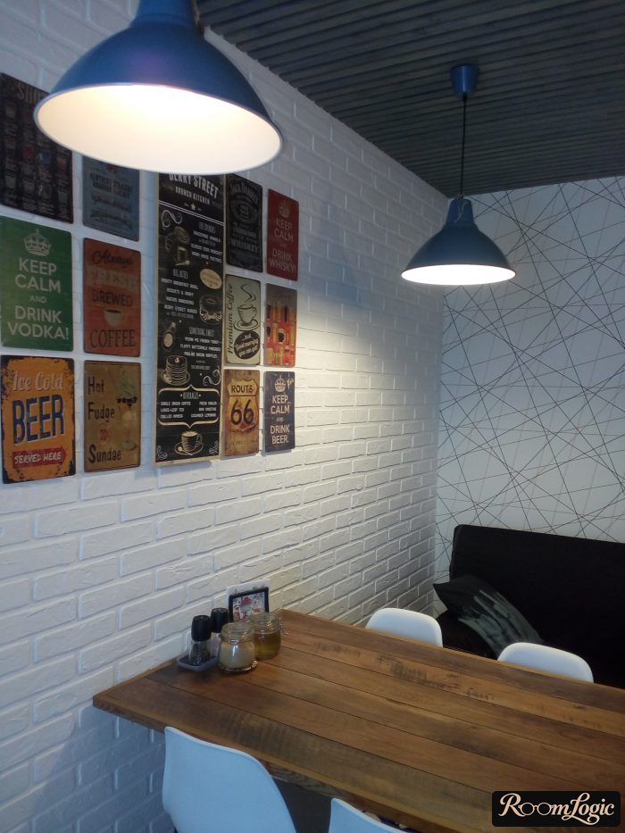combination of wallpaper and white brick in the kitchen interior