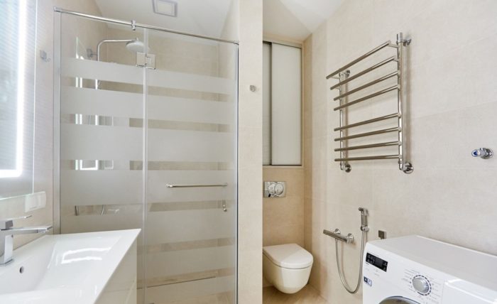 Combined bathroom with a shower
