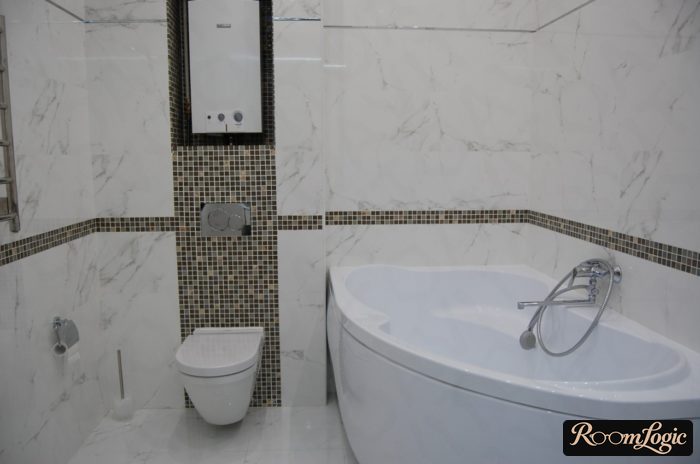 combined bathroom with a water heater