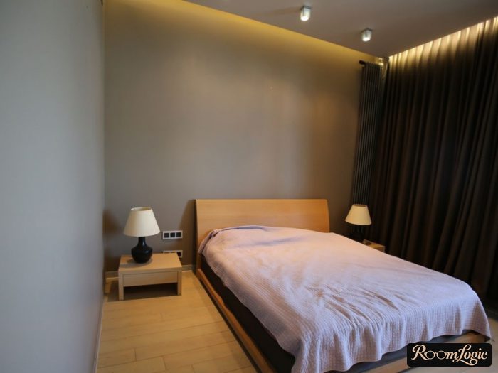 combined wallpaper in a small bedroom