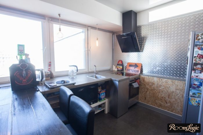 concept kitchen with OSB panel on the wall in loft style