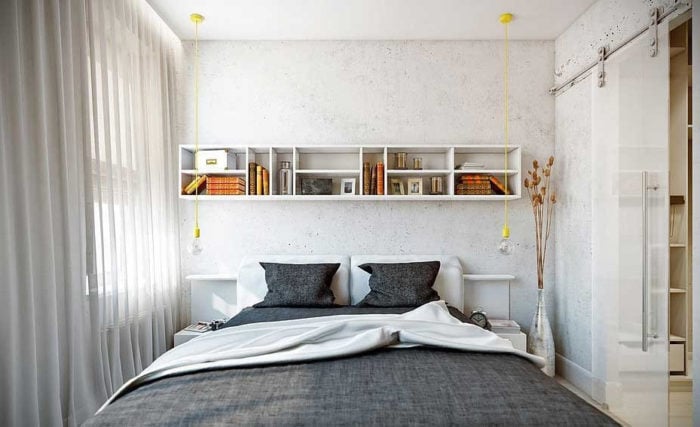 concrete-look decorative plaster in a tiny bedroom