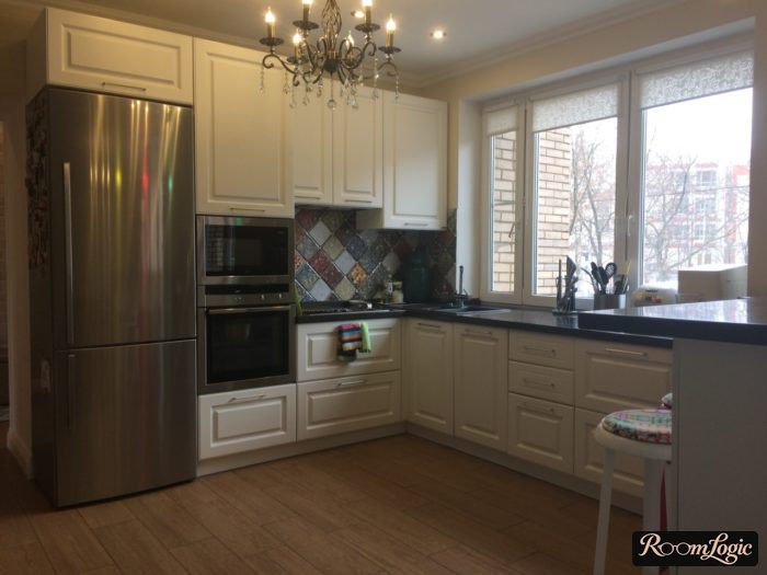 corner kitchen in neoclassical style with sink by the window