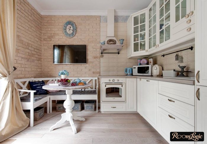 corner kitchen in provence style with dining area in apartment