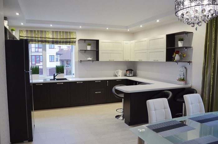 corner kitchen-living room with breakfast bar