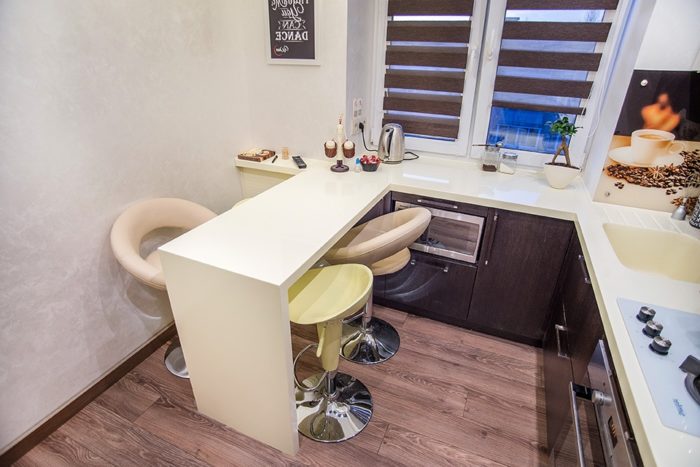corner kitchen with an acrylic breakfast bar