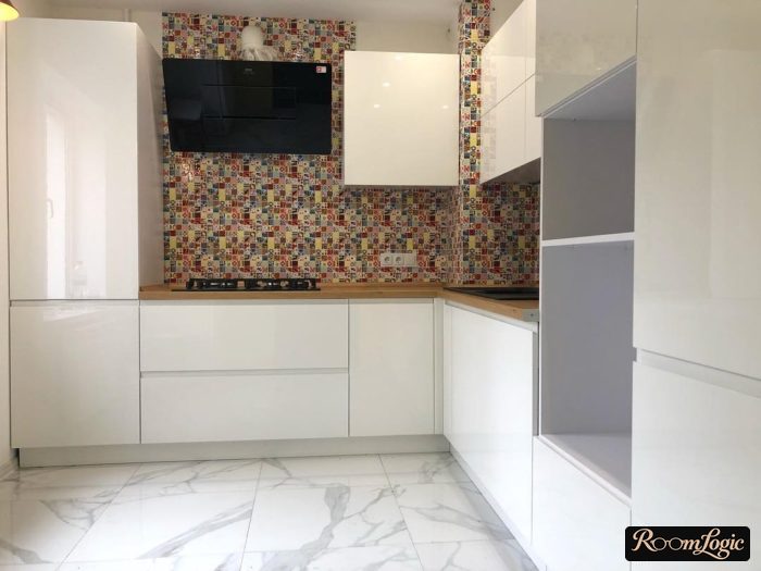 corner white glossy handleless kitchen