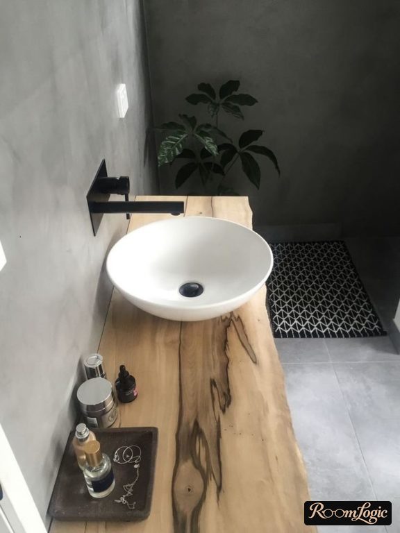 countertop from solid wood in bathroom in loft style