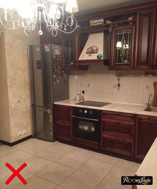 country styled kitchen with mismatched wallpaper