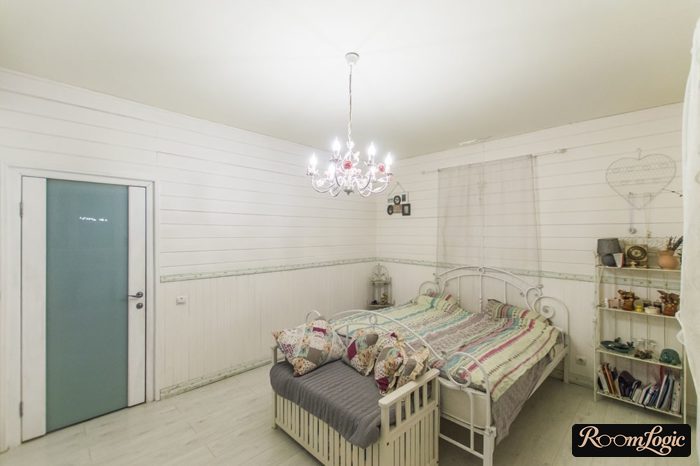 cozy teenage girl's bedroom in light tones