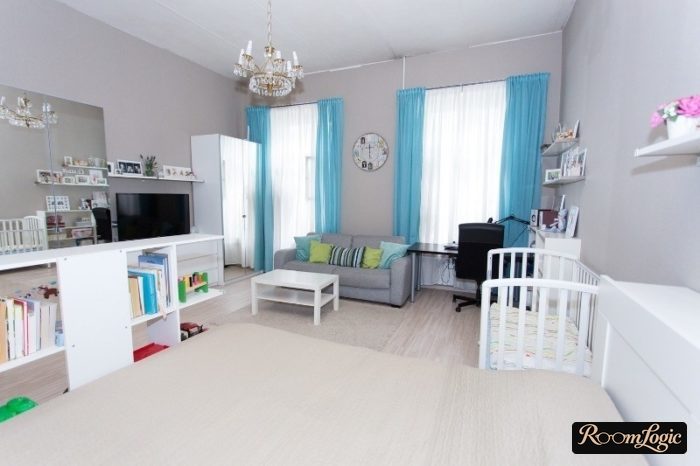 curtains in the bedroom with a kids' bed