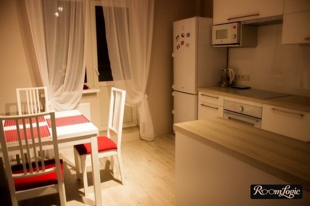 curtains in two halves on the kitchen with a balcony door