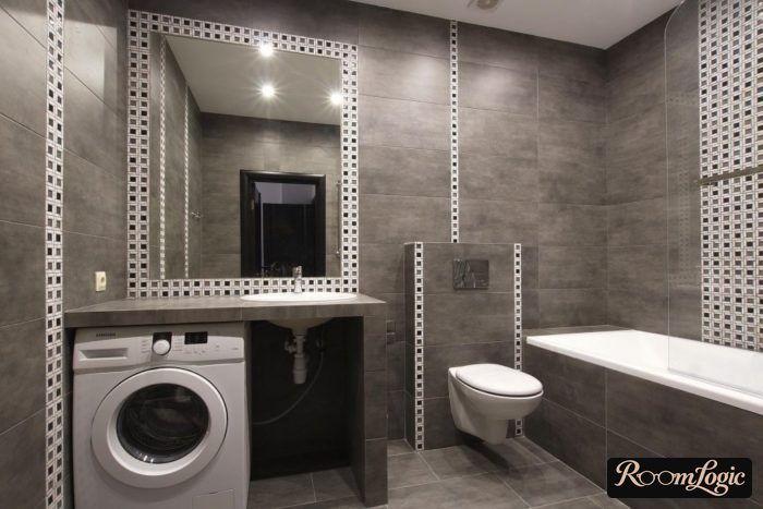 dark bathroom with washer