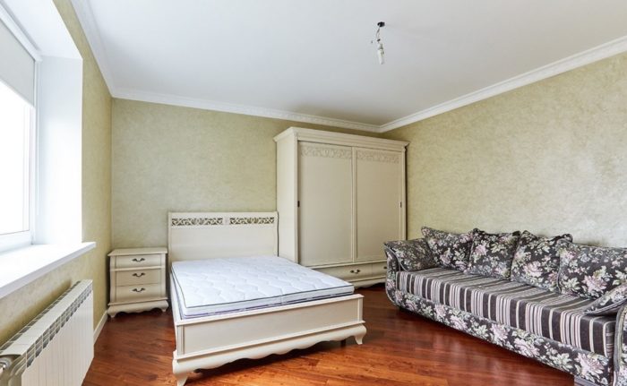 dark beige wallpaper in a classical bedroom