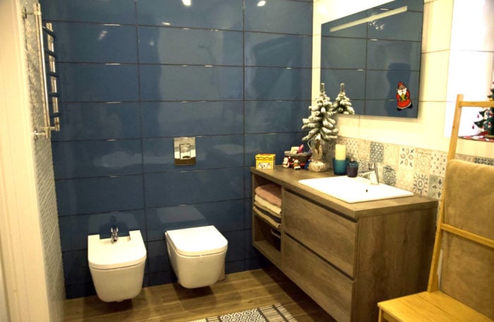dark blue glossy tile in bathroom