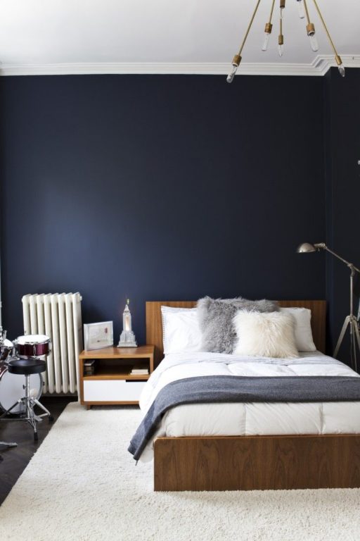 dark blue wall in the bedroom