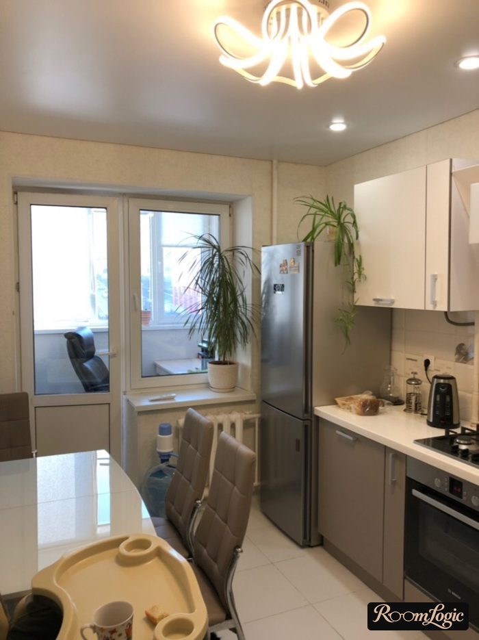 design of 110 square feet kitchen with balcony