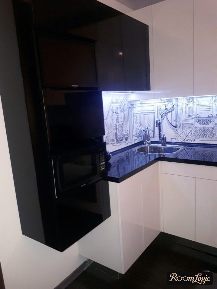 design of a 65 square feet kitchen with a refrigerator