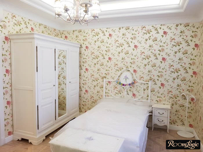 Design of a children's bedroom with white furniture