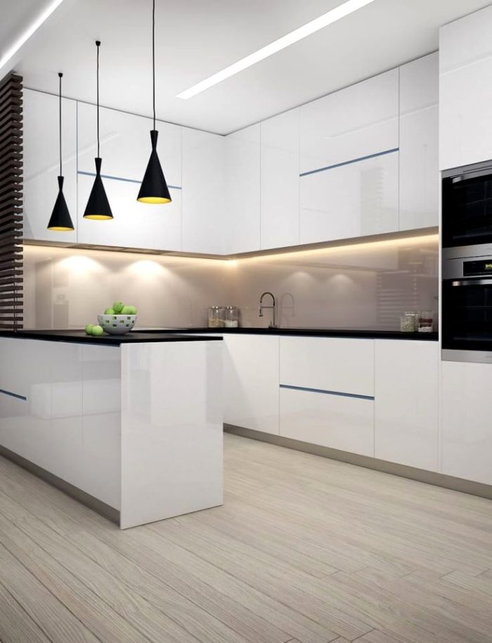 design of a corner kitchen with white glossy cabinet fronts