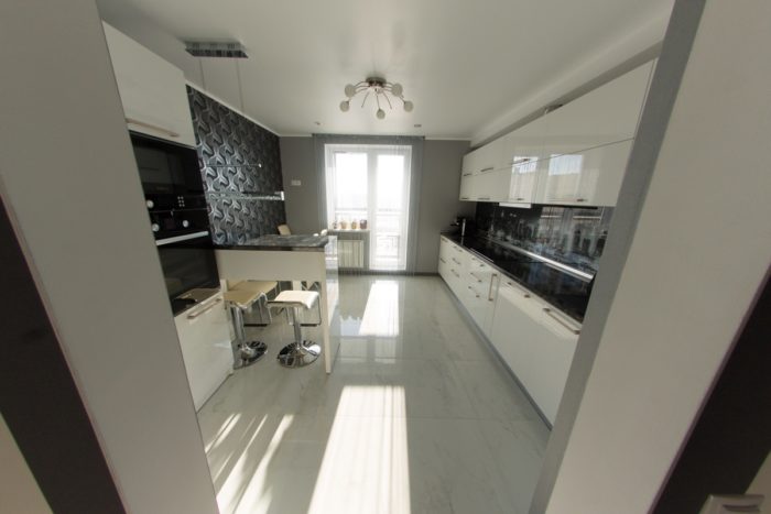 design of a kitchen with a bar counter