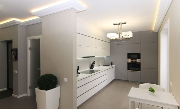 design of a kitchen with ceiling-to-ceiling cabinets