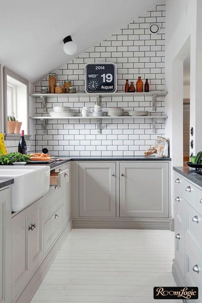 design of a mansard kitchen without upper cabinets