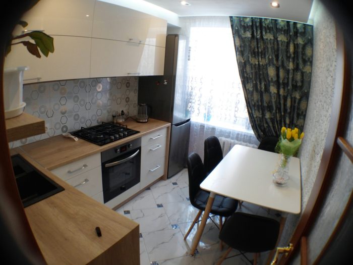 design of a milk-colored small corner kitchen
