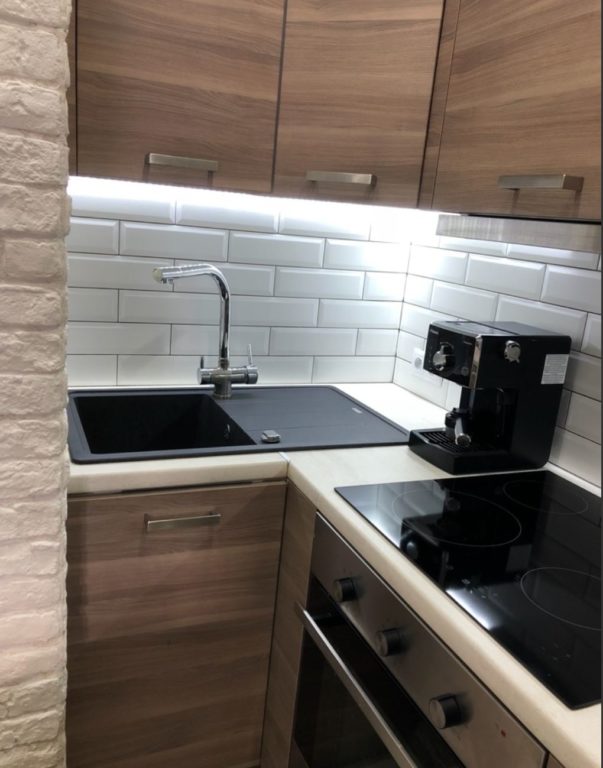 design of a one-bedroom apartment with a small kitchen